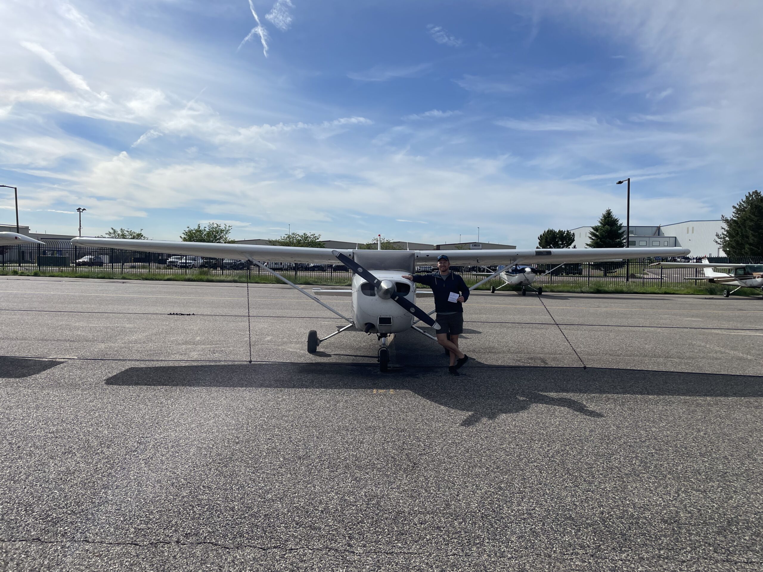 Cessna 172 airplane with student pilot who just earned his pilot license