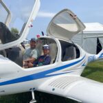 Student pilot and instructor in a Diamond DA40 airplane