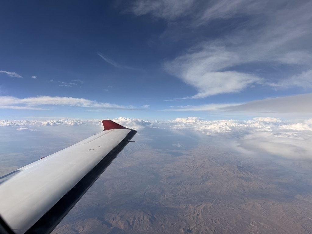 Turboprop wing above a cloud layer in flight