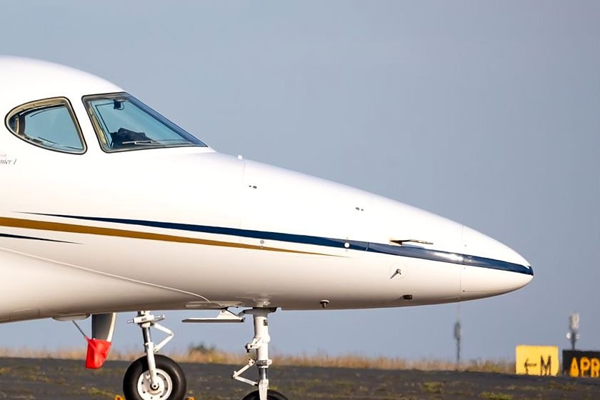 Light business jet on the ramp